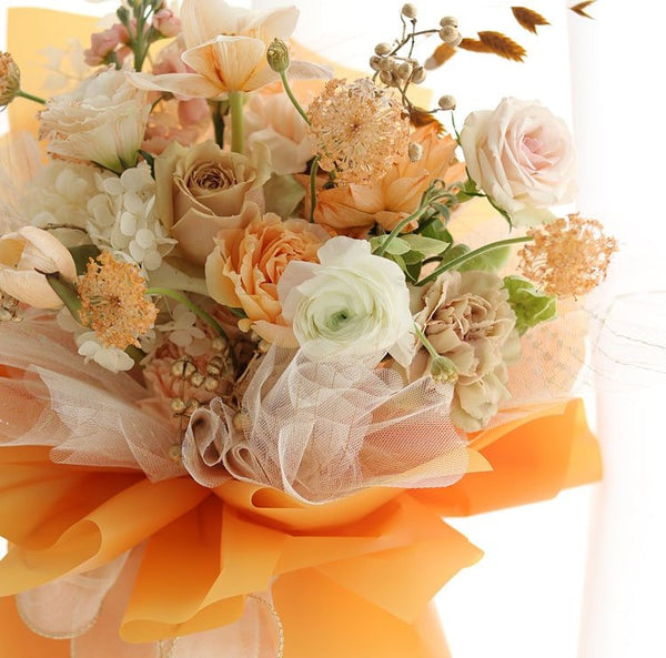 Orange mesh flower wrapping paper.