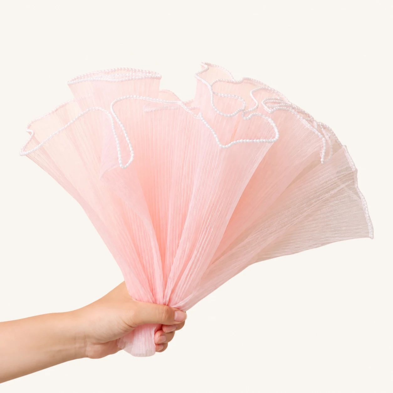 Pink fabric and mesh flower wrap
