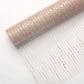 Champagne mesh flower wrapping paper.