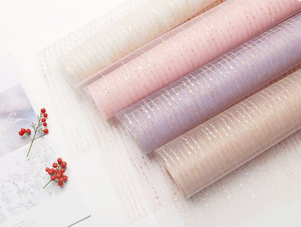 White mesh flower wrapping paper.