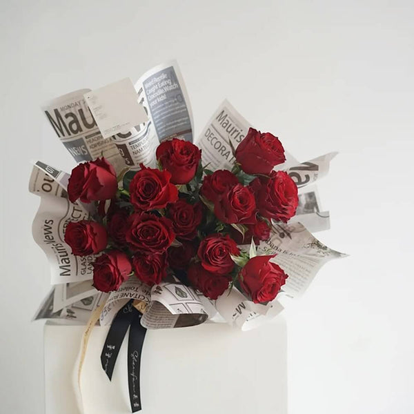    flowers-wrapped-in-newspaper
